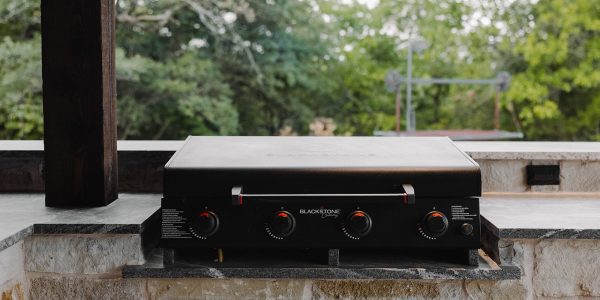 Blackstone grill in a modern outdoor kitchen setup in Celina, TX