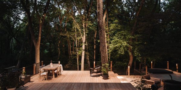 Wooded deck with outdoor dining area in Celina, TX